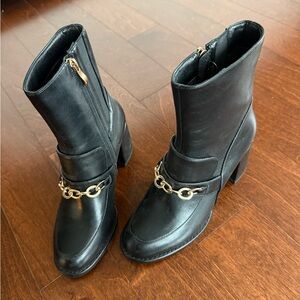 Elegant Black Leather Ankle Boots with Gold Chain